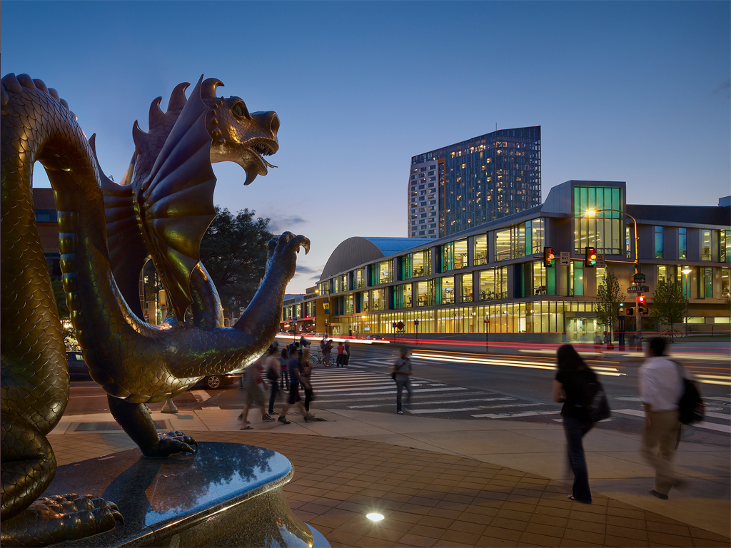 Mario the Dragon statue at night with Rec Center in background